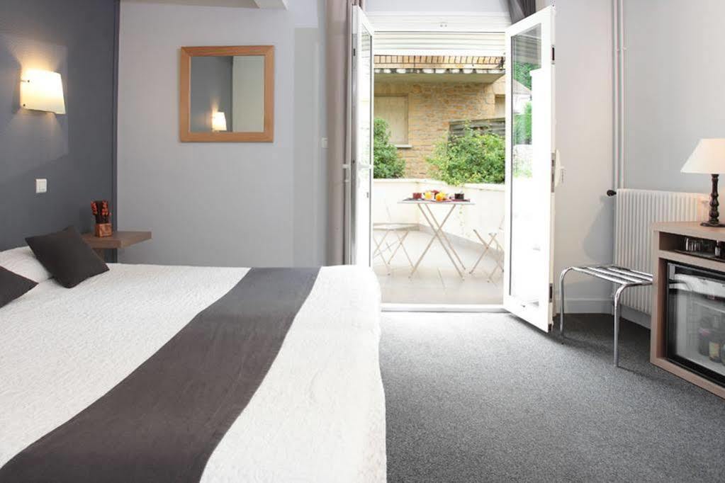 Hotel De Compostelle Sarlat-la-Caneda Bagian luar foto